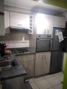 Η κουζίνα ή μικρή κουζίνα στο Departamento El Llano