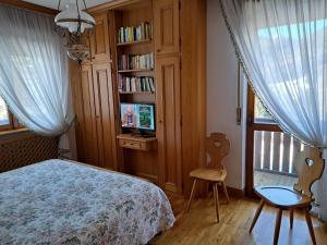 Postel nebo postele na pokoji v ubytování Appartamento Croda