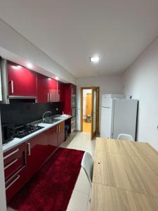 Η κουζίνα ή μικρή κουζίνα στο Quarto Relaxante e Agradável