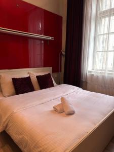 Ένα ή περισσότερα κρεβάτια σε δωμάτιο στο Senezia +3 φωτογραφίες