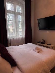 Ένα ή περισσότερα κρεβάτια σε δωμάτιο στο Senezia