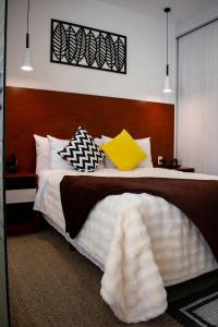 Giường trong phòng chung tại StudioG3