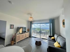 Μια τηλεόραση ή/και κέντρο ψυχαγωγίας στο Appartement Tour d'Omigna Cargèse