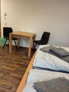 Ένα ή περισσότερα κρεβάτια σε δωμάτιο στο WohnService Apartment