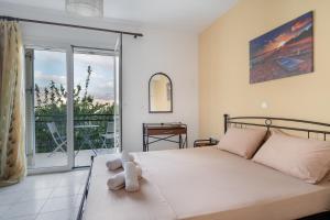 Postel nebo postele na pokoji v ubytování Anna's Apartment 1 Cozy Stay for 3