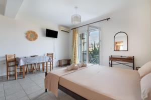 Postel nebo postele na pokoji v ubytování Anna's Apartment 1 Cozy Stay for 3