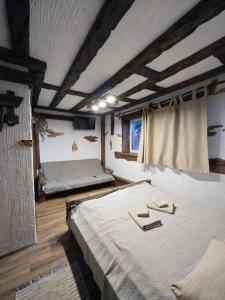 Voodi või voodid majutusasutuse Котеджі Цімбори toas +114 fotot