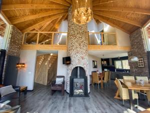 Et opholdsområde på Luxe vakantiehuis Drenthe 10 pers Hottub