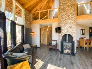 Et opholdsområde på Luxe vakantiehuis Drenthe 10 pers Hottub