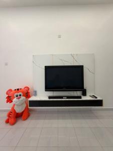 Μια τηλεόραση ή/και κέντρο ψυχαγωγίας στο Lucky 7 Homestay