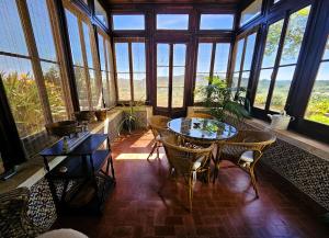 Χώρος καθιστικού στο Quinta do Penedo- Refúgio de Charme e Natureza