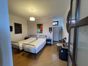 Ένα ή περισσότερα κρεβάτια σε δωμάτιο στο Tenuta Roletto