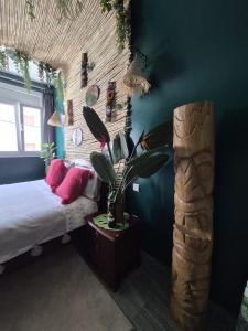 Ένα ή περισσότερα κρεβάτια σε δωμάτιο στο Maison Bleue