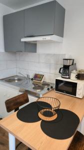 Η κουζίνα ή μικρή κουζίνα στο Le Comte de Saxe - Calme à Blois centre