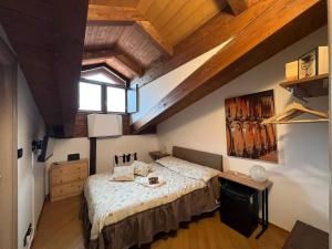 Ένα ή περισσότερα κρεβάτια σε δωμάτιο στο Tenuta Roletto