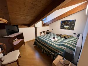 Ένα ή περισσότερα κρεβάτια σε δωμάτιο στο Tenuta Roletto