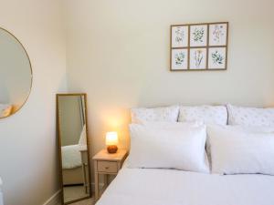 Ένα ή περισσότερα κρεβάτια σε δωμάτιο στο Oversands View