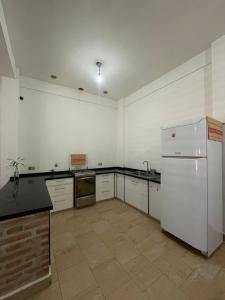 Η κουζίνα ή μικρή κουζίνα στο Hospedaje La Brasilera +1 φωτογραφίες