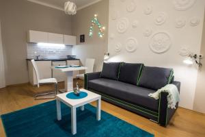 Posedenie v ubytovaní Concept Apartments