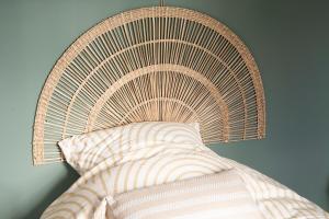 Ένα ή περισσότερα κρεβάτια σε δωμάτιο στο Au pied du Clocher - Centre ville