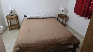 Postel nebo postele na pokoji v ubytování Casa Amplia 2 Dormitorios con Cochera Cerrada y Patio privado