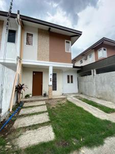 a house with a driveway in front of it at As Thetic Transient in San Pablo
