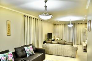 Χώρος καθιστικού στο Strandlopertjie2 #3 Self-catering Home