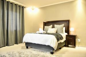 Ένα ή περισσότερα κρεβάτια σε δωμάτιο στο Strandlopertjie2 #3 Self-catering Home