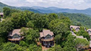 an aerial view of a house in the woods at Echota Ridge Boulders in Banner Elk