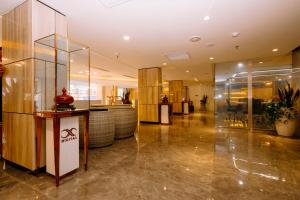 a lobby of a building with a glass wall at X-Digital HOTEL in Bắc Ninh