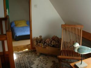 En eller flere senge i et værelse på Chambres - Ferme De Créac'h-Gourlès