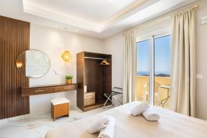 Ένα ή περισσότερα κρεβάτια σε δωμάτιο στο Mikes Apts +41 φωτογραφίες