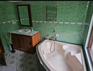 Koupelna v ubytování Village by the river