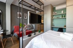 TV a/nebo společenská místnost v ubytování Yume Maceió By You