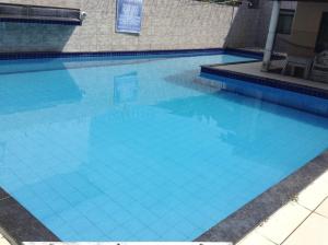 Swimming pool sa o malapit sa Condominio Sao Cristovao