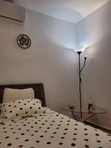 Postel nebo postele na pokoji v ubytování Daria's cozy studio