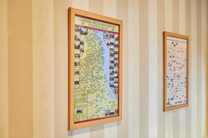a framed map hanging on a wall at Host & Stay - The Shipshape in Seahouses