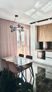 Η κουζίνα ή μικρή κουζίνα στο Автовокзал ЖК Great House