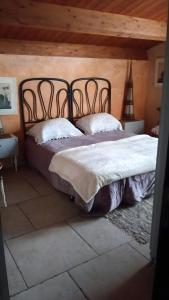 Ένα ή περισσότερα κρεβάτια σε δωμάτιο στο Bio Bonizio nel Borgo +34 φωτογραφίες