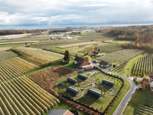 an aerial view of a farm with a bunch of crops at Hundweiler Hofheimat in Markdorf