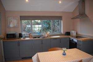 Kuchyň nebo kuchyňský kout v ubytování River View