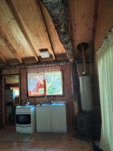 Η κουζίνα ή μικρή κουζίνα στο Cabañas mountain Native forest