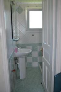 Koupelna v ubytování Odysseia Studios and Apartment