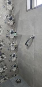 Ένα μπάνιο στο Nandini Cottage, A premium boutique Homestay