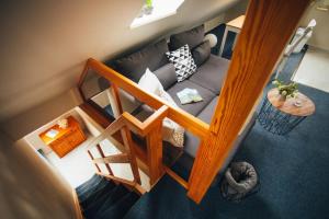 an overhead view of a living room with a couch at Haus Jelena Appartement 3 in Borkum