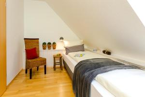 Ένα ή περισσότερα κρεβάτια σε δωμάτιο στο Haus Tidehuus +4 φωτογραφίες