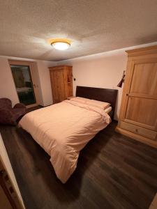 Ένα ή περισσότερα κρεβάτια σε δωμάτιο στο La volta delle Dolomiti