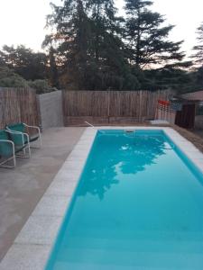 Bazén v ubytování El descanso nebo v jeho okolí