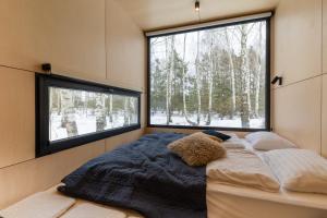 Una cama o camas en una habitación de УЛІС Кебіни