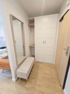 Ένα ή περισσότερα κρεβάτια σε δωμάτιο στο Studio Małgosia